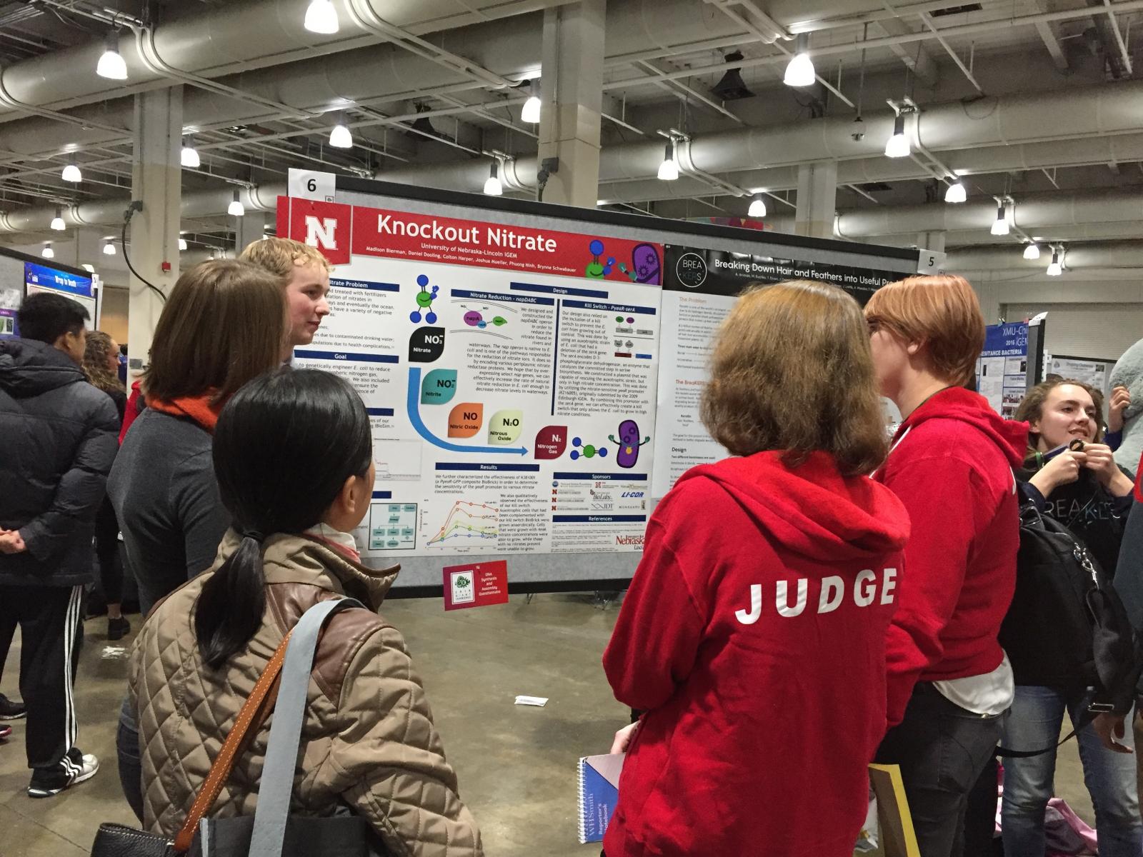 The iGEM team presents at the International Competition in Boston. 